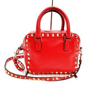 Valentino Garavani Mini Rockstud Cherry Red Shoulder Bag.